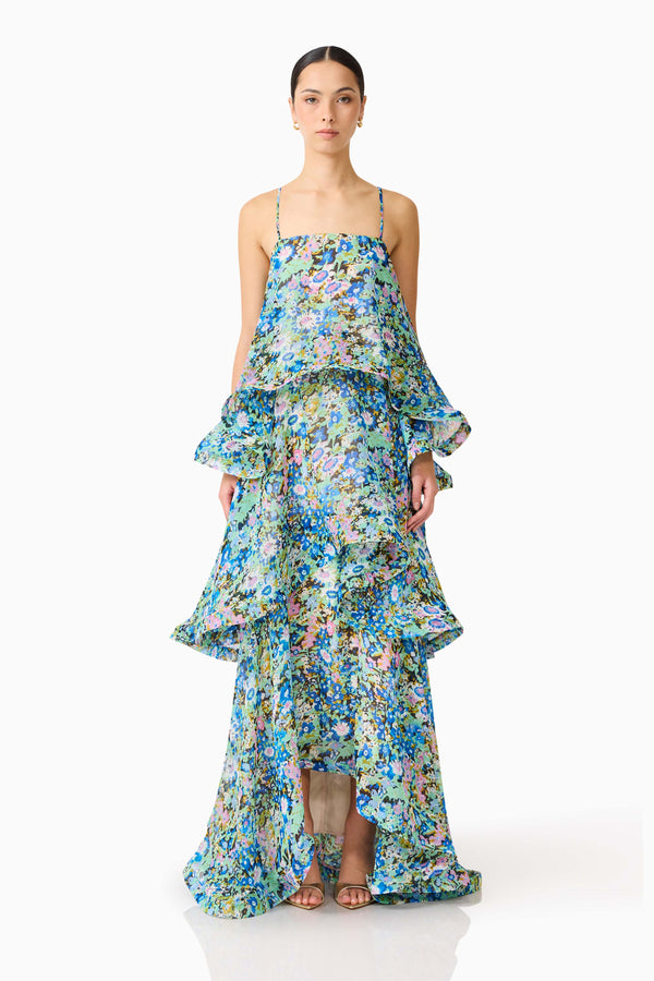 Brunette model wearing the Armani Tiered Maxi Dress In Blue Floral front shot