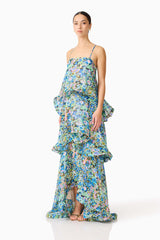 Brunette model wearing the Armani Tiered Maxi Dress In Blue Floral side shot