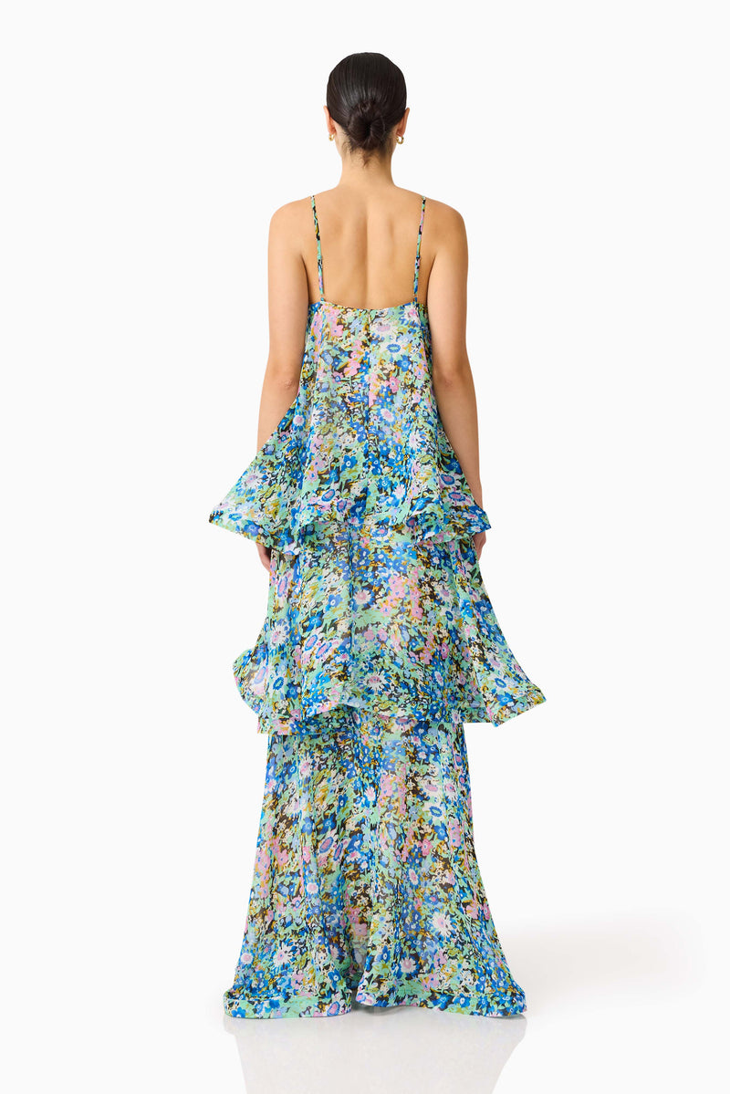 Brunette model wearing the Armani Tiered Maxi Dress In Blue Floral back shot
