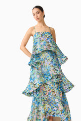 Brunette model wearing the Armani Tiered Maxi Dress In Blue Floral close up posed shot