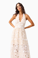 Brunette model wearing the Sienna V-Neck Gown in Cream close up shot