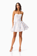 Brunette Model wearing the Fiorella Jacquard A-Line Mini Dress in Blue posed shot