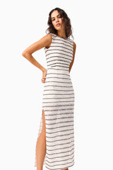 Brunette model wearing the Eldora Low Back Midi Dress in Black & White close up shot