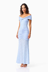 Brunette model wearing the Valencia Lace Gown in Blue side shot