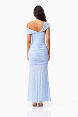 Brunette model wearing the Valencia Lace Gown in Blue back shot
