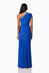 model wearing is VIENNA FITTED MAXI GOWN IN BLUE back shot