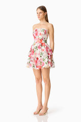 Blonde model wearing the Roselle Strapless Mini Dress Pink Floral side shot 