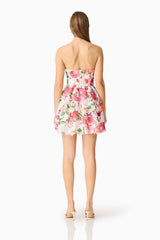 Blonde model wearing the Roselle Strapless Mini Dress Pink Floral back shot 