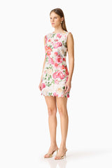 Blonde model wearing the Roselle Shift Mini Dress Pink Floral side shot