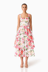 Brunette model wearing the Roselle Tiered Midi Dress Pink Floral front shot
