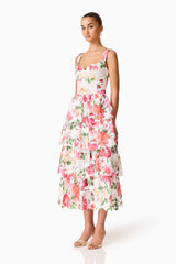 Brunette model wearing the Roselle Tiered Midi Dress Pink Floral side shot