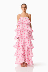 Brunette model wearing the Sola Tiered Maxi Dress in Pink Polkadot front shot
