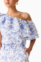 Brunette model wearing the Elin Top & Short Set in Blue Floral detail shot