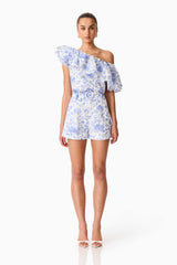 Brunette model wearing the Elin Top & Short Set in Blue Floral front shot