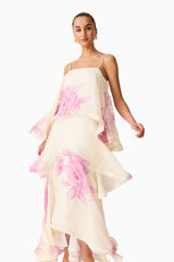 Brunette model wearing the Rova Tiered Gown in Cream & Pink Floral posed shot