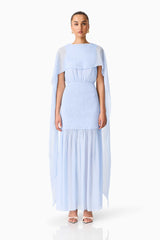 Brunette model wearing the Eliane Cape Gown in Blue front shot 