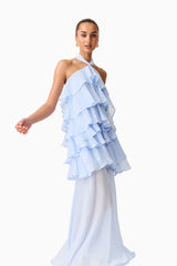 Brunette model wearing the Eliane Halter Neck Maxi Dress in Blue posed shot 