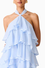 Brunette model wearing the Eliane Halter Neck Maxi Dress in Blue detail shot 