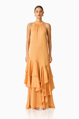 Varella Halter Gown in Orange with a frilled skirt front shot
