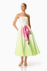 Brunette model wearing the Elisa Strapless Gown in Green & Pink Floral posed shot