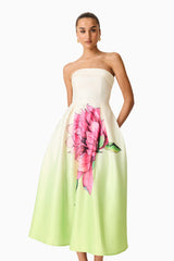 Brunette model wearing the Elisa Strapless Gown in Green & Pink Floral close up shot