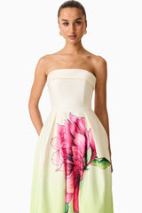 Brunette model wearing the Elisa Strapless Gown in Green & Pink Floral detail shot