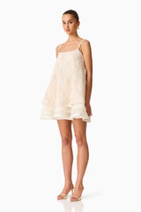 Brunette model wearing the Vessia Shift Mini Dress in White Side Shot