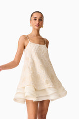 Brunette model wearing the Vessia Shift Mini Dress in White Close Up Shot