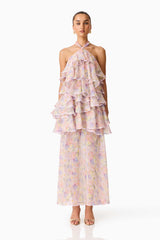 Brunette model wearing the Alinda Halter Neck Maxi Dress in Pink Floral front shot