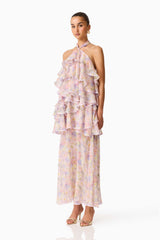 Brunette model wearing the Alinda Halter Neck Maxi Dress in Pink Floral side shot
