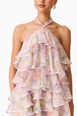 Brunette model wearing the Alinda Halter Neck Maxi Dress in Pink Floral detail shot