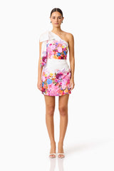 Brunette model wearing the Alice One Shoulder Mini Dress in Ombre Floral front shot 