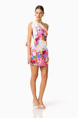 Brunette model wearing the Alice One Shoulder Mini Dress in Ombre Floral posed front shot 