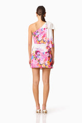 Brunette model wearing the Alice One Shoulder Mini Dress in Ombre Floral back shot 