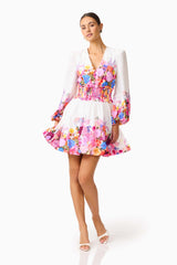 Brunette model wearing the Alice Long Sleeve Mini Dress in Ombre Floral posed front shot 