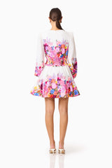Brunette model wearing the Alice Long Sleeve Mini Dress in Ombre Floral back shot 