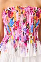 Brunette model wearing the Alice Tiered Gown in Ombre Floral detail shot 