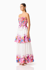 Brunette model wearing the Alice Tiered Gown in Ombre Floral side shot 