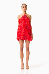 Brunette model wearing the Yvette Halter Mini Dress in Vermilion Red front shot 