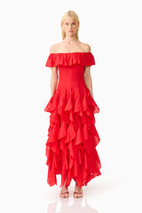 Brunette model wearing the Yvette Off Shoulder Gown in Vermilion Red front shot 