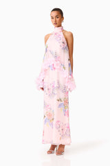Brunette model wearing the Millie Tiered Gown in Pink Floral side shot 
