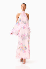Brunette model wearing the Millie Tiered Gown in Pink Floral posed shot 
