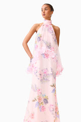 Brunette model wearing the Millie Tiered Gown in Pink Floral posed close up shot 
