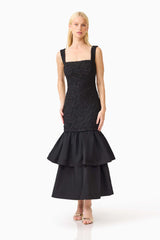 Brunette model wearing the Alexandra Tiered Gown in Black posed front shot 