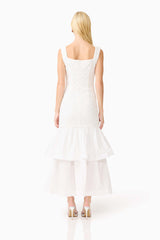 Brunette model wearing the Alexandra Tiered Gown in White back shot 
