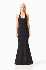 Brunette model wearing the Alexandra Halter Gown Dress in Black front shot 
