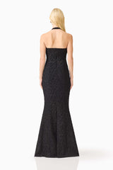 Brunette model wearing the Alexandra Halter Gown Dress in Black back shot 
