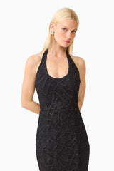 Brunette model wearing the Alexandra Halter Gown Dress in Black close up shot 
