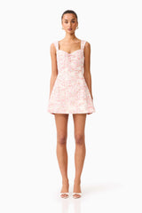 Brunette model wearing the Valencia Mini Dress in Pink & Cream Floral front shot 

