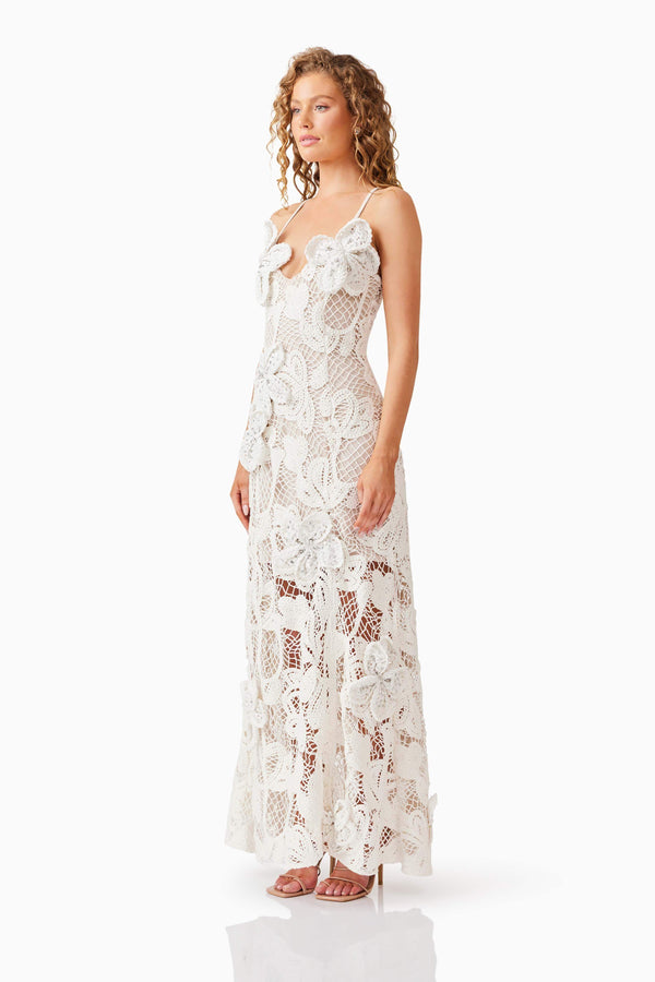 Blonde model wearing Kyra Crochet Gown in White side shot